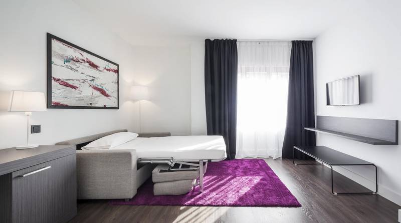 Habitación triple Hotel ILUNION Suites Madrid