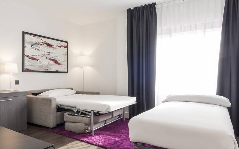 Habitación para 4 personas Hotel ILUNION Suites Madrid